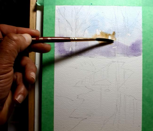 snowy forest with river watercolor winter landscape painting tutorial step 2 adding burnt umber