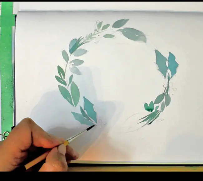 Adding pine needles to a watercolor Christmas wreath